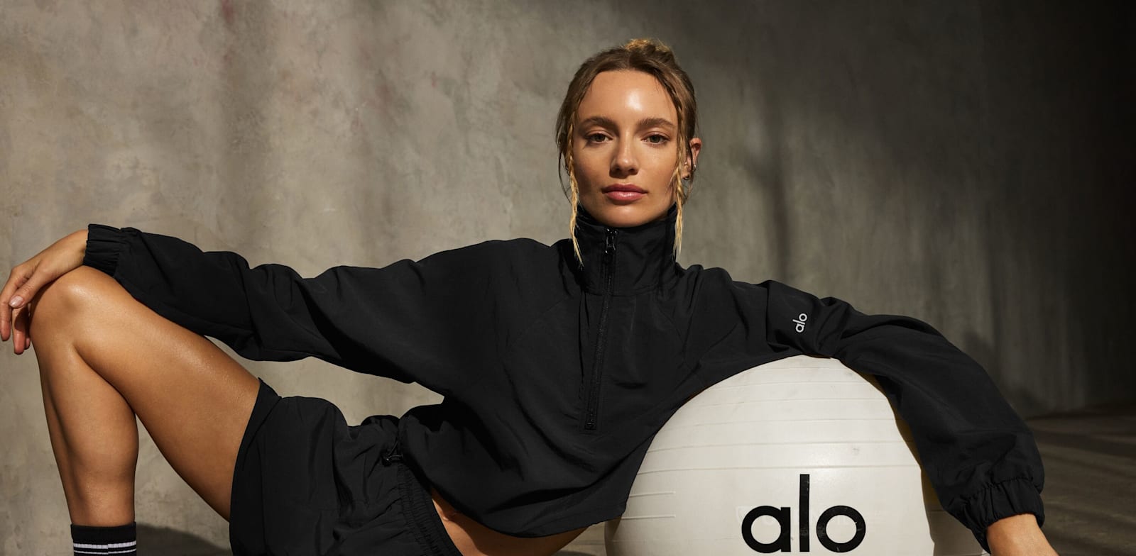 Alo Yoga Sports Brand Image